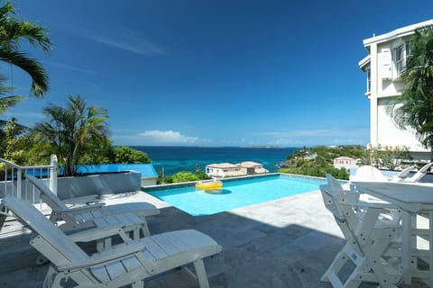The shared sun deck and pool area are a fun place to relax after a day at the beach