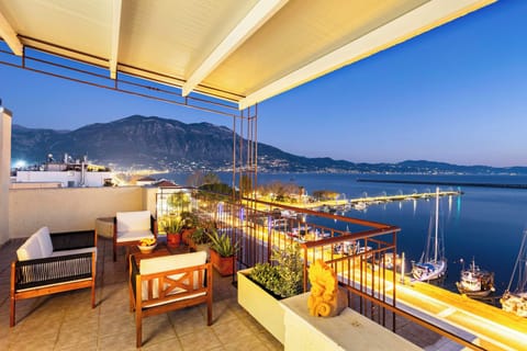 Stunning Night View of the Messinian Bay and Tatgetus Mountain from the Outdoor Sitting area