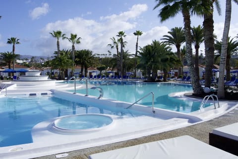 Outdoor pool, pool umbrellas, sun loungers
