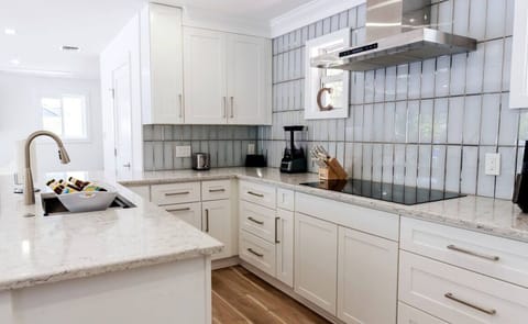 Gorgeous kitchen. The door in the picture leads to the half bathroom.