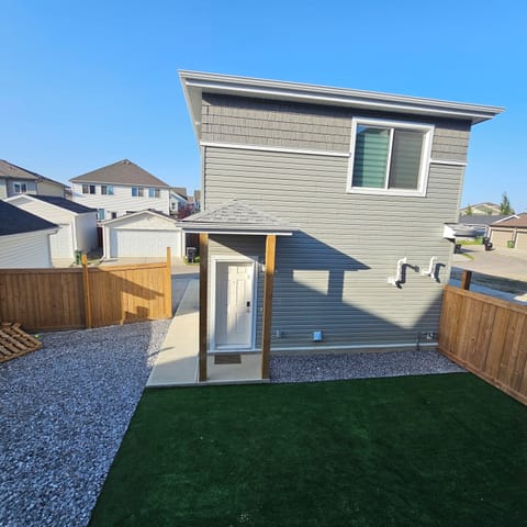 Beautifully Landscaped showing access to Garden suite