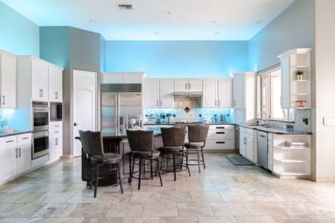 Gourmet, fully stocked kitchen designed for elevated cooking and entertaining.