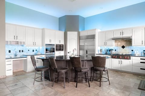 A gourmet kitchen offering professional-style features and full cooking essentials.