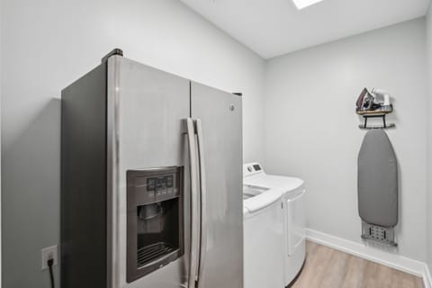 To make sure you have everything you need, there is also an additional refrigerator and full size washer and dryer on the first floor for your convenience.