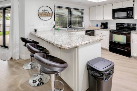 The breakfast bar is great for overflow seating and to watch the chef in action.