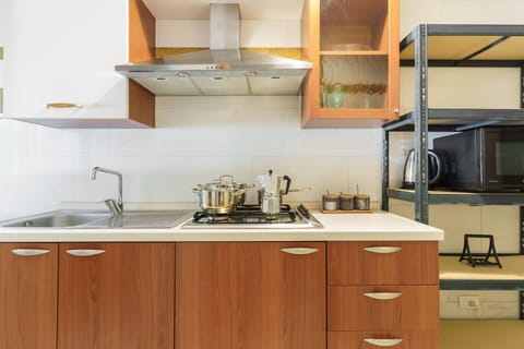 Kitchen Appliance, Kitchen, Countertop, Major Appliance, Cabinetry, Kitchen Stove, Stove, Gas Stove, Wood, Kitchen Sink