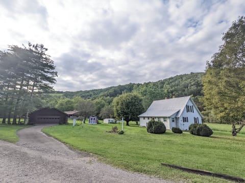 Picturesque countryside home surrounded by lush greenery and serene landscapes.