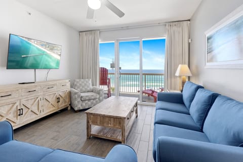 Relax in your bright coastal living room with ocean views and comfortable seating for memorable beachfront moments.