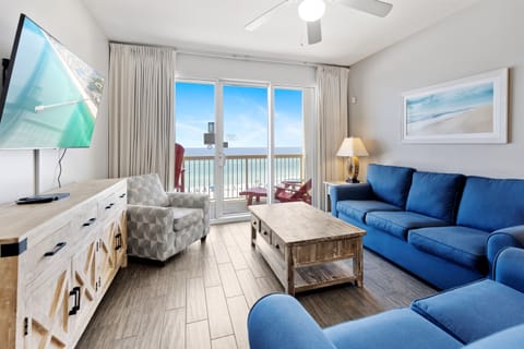 Relax in coastal comfort with ocean views from your private balcony and cozy seating perfect for unwinding after beach days.