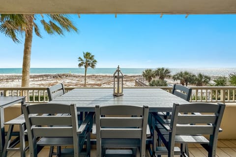 This charming private balcony is an extension of your living room, offering a serene and personal space for outdoor dining.