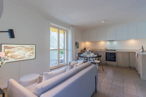 Apartment (2 Bedrooms) | Living area | 32-inch Smart TV with cable channels