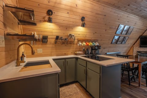 With an electric stove and workstation sink, you should be equipped to cook your favorite cabin foods.