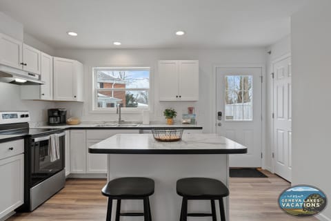 Large area for cooking and congregating with easy access to the back yard.