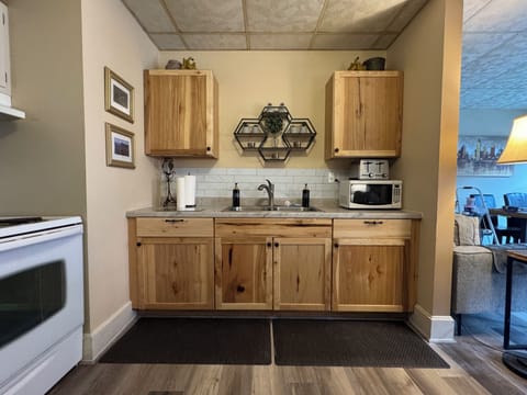 Equipped with kitchen essentials and includes hand and dish soap, paper towels