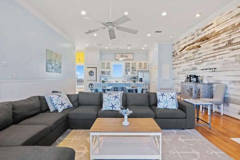 Movie nights just got an upgrade!  Stretch out on the oversized sectional, stream your favorites on the big screen, and let the calming waves outside be your background soundtrack #ComfortMeetsLuxury