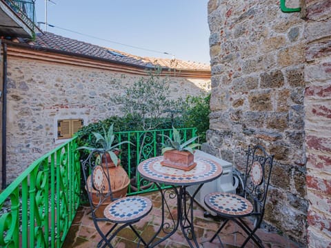 Wall, Flowerpot, Houseplant, Iron, Balcony, Chair, Outdoor Furniture, Outdoor Table, Flagstone, Handrail