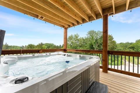Relax in a private hot tub on the back deck!