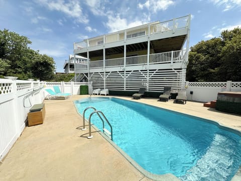 Private Outdoor Pool Area with Loungers and Hot Tub