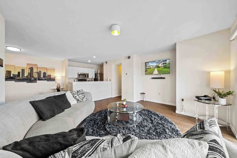 Condo, 1 Queen Bed, Balcony (The Urban Oasis) | Living area | 42-inch flat-screen TV with digital channels