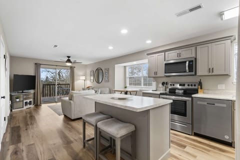 The bright, open kitchen offers ample space & every home comfort