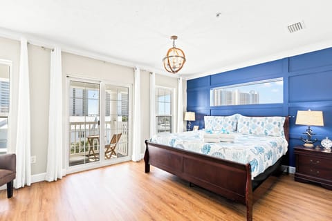 Sailor's Cove A Panama City Beach Vacation Rental - Large master bedroom with king bed and ensuite bath and private balcony!