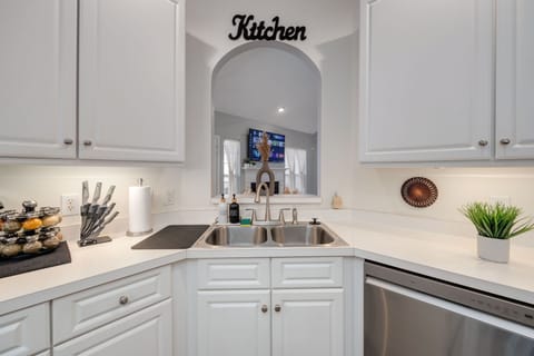 The fully stocked kitchen is perfect for cooking meals.