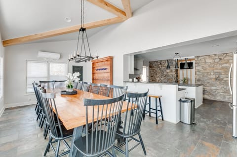 Dining Room: Gather around the impressive table for unforgettable meals and laughter!