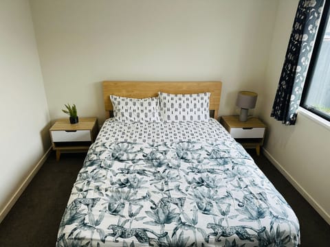 Enjoy in bedroom equipped with queen sized bed, bedside drawers, in-wall heater.