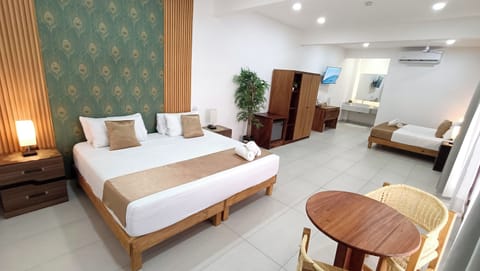 Hypo-allergenic bedding, down comforters, in-room safe, blackout drapes