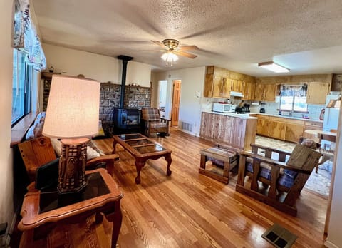 View from dining nook into living room and kitchen
