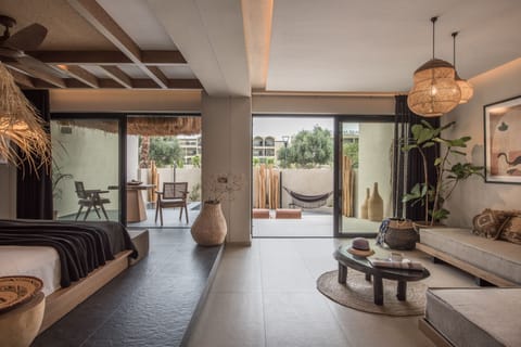 Jungle Suite (Jacuzzi) | Living area | Flat-screen TV