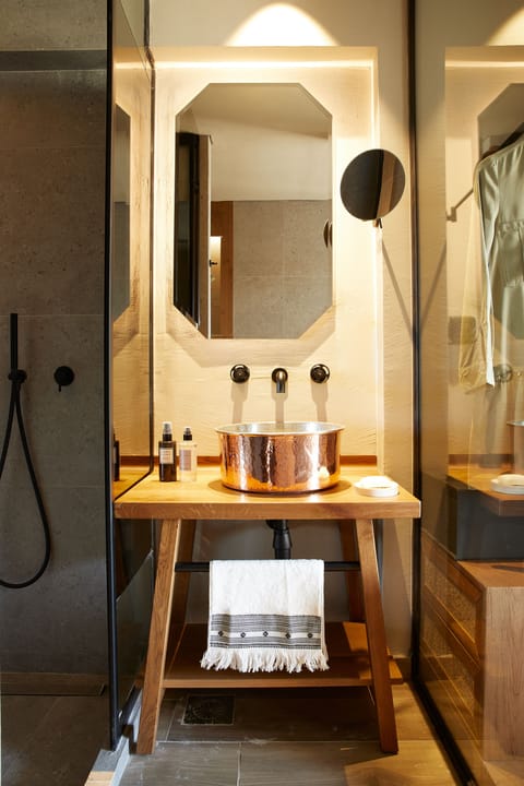 Shower, rainfall showerhead, hair dryer, towels