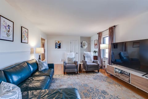 large living room with 70" TV with wifi and apps ready to watch