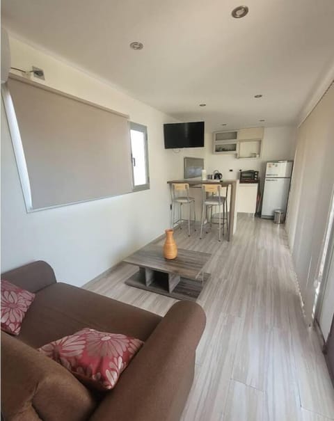 Family Apartment, Patio, Courtyard View | Living area | 32-inch Smart TV with satellite channels, Netflix, DVD player