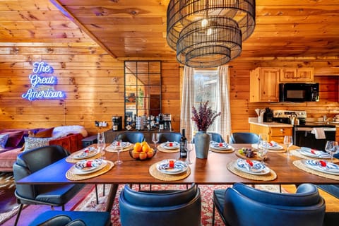 Spacious dining room with a table that comfortably seats 10.
