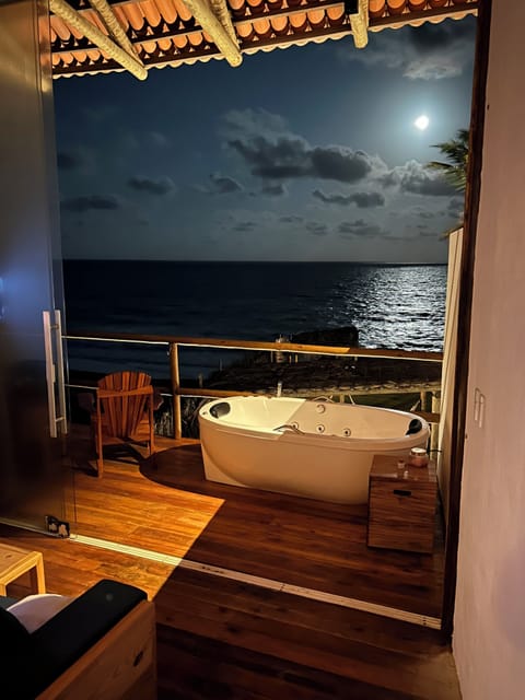 Deluxe Double Room, Balcony, Beach View | In-room safe, desk, laptop workspace, blackout drapes