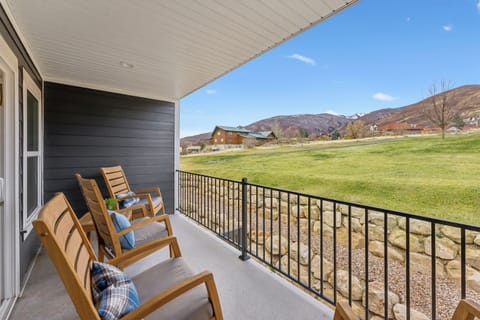 Enjoy fresh mountain air and stunning scenery from the loft’s private balcony.