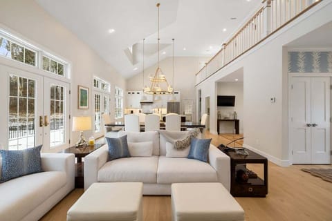 View of the living room into dining area and kitchen.