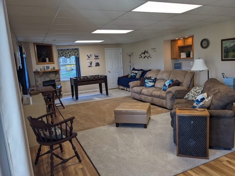 Spacious living room w/ twin day bed and twin trundle available if needed.