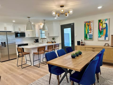 New furnishings & appliances. Enjoy the open kitchen, dining & living area.