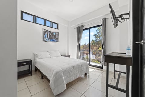 Comfort Room, Balcony, Mountain View | Blackout drapes, iron/ironing board, free WiFi