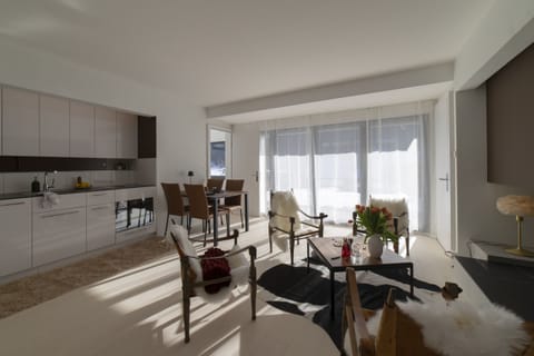 Bright living and dining area with an open-plan kitchen