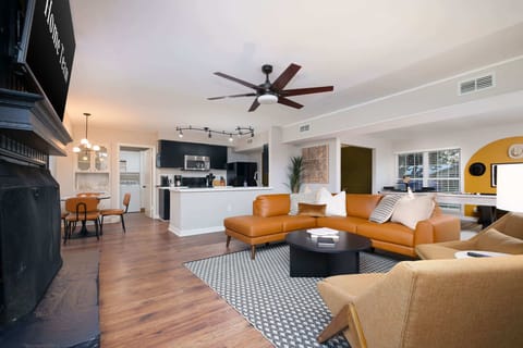 Experience open-concept living at its finest, where the living room, kitchen, and game room seamlessly come together.