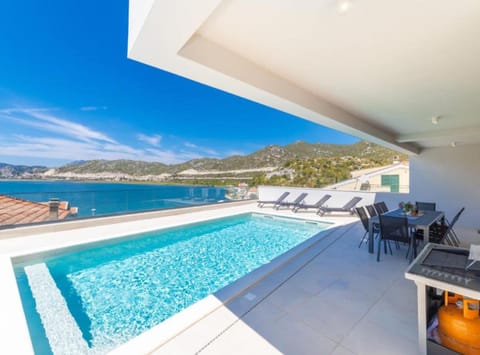House (Holiday Home) | Pool | Outdoor pool, sun loungers