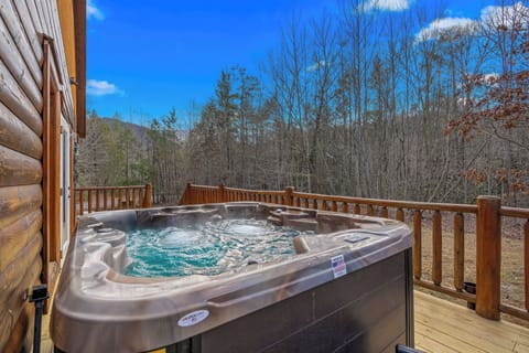 Relax and unwind in a private hot tub!