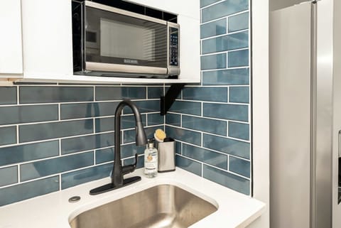 The updated kitchen offers ample space & all the comforts of home