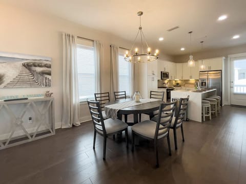 Dining table seating 6, plus bar seating for 4 more.