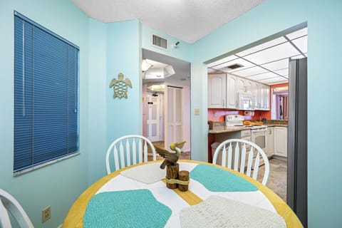 Comfortable dining area with easy kitchen access.