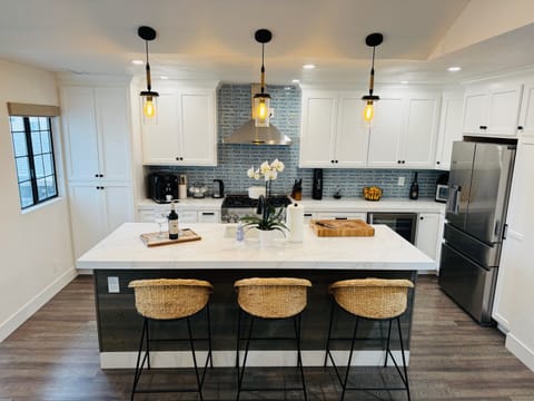 Bright spacious well stocked kitchen