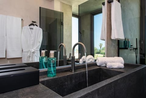 Shower, free toiletries, hair dryer, slippers